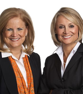 Portrait of Lee Stratton & Debbie Momberg, REALTOR®.